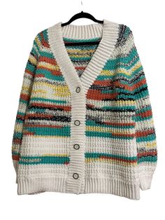 This is a very textured Raglan style cardigan with matching Hat. It's crocheted with a soft acrylic yarn.🧶  This color is called Painted Canyon and Antique White for the ribbing.    Care: Hand Wash for best results but can be washed on gentle cycle  Size: XLarge Length: 28" Sleeve: 22" Width: 47" Material: Acrylic Yarn 🧶  Smoke Free Home Spring Acrylic Yarn Knitted Cardigan, Multicolor Textured Knit Winter Cardigan, One Size Yarn Cardigan For Fall, Multicolor Textured Knit Cardigan For Spring, Cozy Knit Yarn Cardigan, Crochet Acrylic Cardigan For Winter, Winter Knit Yarn Cardigan, Winter Crochet Acrylic Cardigan, Knit Yarn Cardigan For Fall