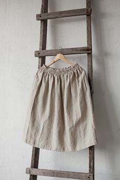 Below the knee skirt is made from 100% soft and washed linen. This Petticoat is perfect for wearing under dress or other skirt or can be worn alone. Match it with our tunics! Details: - Composition: 100% Oeko-Tex certified linen - Colour: natural - Elastic waist - Pockets - Size: One size/fits all - Medium weight linen - Linen care: machine wash gentle; tumble dry low, ironing optional - The price is for one skirt, other pictured items are not included Linen Mini Skirt For Summer, Linen Midi Skirt With Elastic Waistband, Summer Mini Linen Skirt, Spring Linen Skirted Bottoms, Relaxed Linen Mini Skirt, Summer Linen Mini Skirt, Relaxed Linen Skirt With Elastic Waistband, Flowy Linen Mini Skirt, Relaxed Fit Linen Mini Skirt