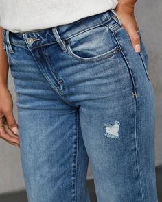 Embrace the cool, casual vibe of fall with the Ayda Distressed Mid Rise Straight Leg Jeans. Designed from a soft stretch denim fabric, these jeans offer a flattering mid-rise fit that’s both versatile and effortless. The straight leg cut gives them a timeless appeal, while light whiskering and intentionally destroyed areas add a touch of lived-in charm. Perfect for pairing with everything from cozy sweaters to tailored blazers, the Ayda jeans seamlessly transitions from day to night. Runs large, consider sizing down Stretch denim fabric Light whiskering and intentionally destroyed areas 5-pocket styling Zip fly with button closure 100% Cotton Stretch Cropped Jeans With Frayed Hem In Medium Wash, Mid-rise Washed Blue Distressed Cropped Jeans, Fall Mid-rise Jeans With Frayed Hem, Everyday Distressed Dark Wash Flare Jeans, Distressed Mid-rise Cropped Jeans For Everyday, Stretch Ripped Medium Wash Cropped Jeans, Everyday Distressed Denim Blue Jeans, Distressed Denim Blue Jeans For Everyday, Everyday Ripped Cropped Jeans For Fall