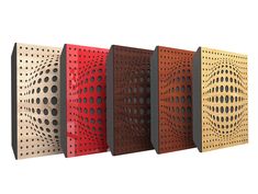 four different colored perfored panels with holes on them, all lined up in a row