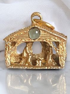 AMAZING Vintage 1950’s 14k Gold 3D Religious NATIVITY Lords Prayer Charm Pendant RARE! Lovely vintage manger charm, depicting the traditional imagery of Christ's birth! Very detailed creche, or Nativity, crafted of solid 14k yellow gold! To be worn on a chain as a pendant or it stands on its own, easy to display in a keepsake frame if you wanted! A small glass bubble is printed with the Lord's Prayer, seen in full view through the tiny window. Measures approximately 3/4” high with bale x 5/8” wide. Weighs 3.1 grams! Will ship FAST, fully insured and gift boxed! Tiny Window, Lords Prayer, The Lord's Prayer, Lord's Prayer, Glass Bubble, The Lords Prayer, Vintage Watches, Charm Pendant, Antique Jewelry