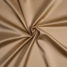 Mood presents a stunning Premium Italian Croissant/Beige Stretch Satin from the epicenter of fashion and fabric: Italy. Elegant and lustrous, this Italian satin is so smooth, made solely of the finest quality. Comprising a supreme blend of acetate, nylon and elastane, anticipate a superb amount of give along the crosswise grain. Of a medium weight and with a full-bodied drape, this collection of stretch satins will make a richly hued array of garments perfect for special occasion wear, costumes Italian Croissant, Wedding Dress Gown, Stretch Satin Fabric, For Wedding Dress, Mood Fabrics, Natural Gold, Dress Gown, Stretch Satin, Italian Fabric