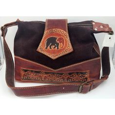 This Is A Beautiful Leather Purse/Shoulder Bag/Handbag With An Adjustable Strap. The Stitching And Details Are Adorable. Really Cute Boho/Hippie Style. Diesel Brown Leather Measurements Are Approximately 13.5" X 3.75" X 9" Tall. In The Photos, The Strap Is 33" And Can Extend One More Inch. One Zippered Inside Pocket We Do Our Very Best To Disclose Everything We See With Photos & Descriptions. Colors May Vary A Shade Or Two Due To The Lighting. New With Tags Brown Leather-lined Pouch Satchel, Brown Leather Lined Hobo Shoulder Bag, Brown Leather Backed Shoulder Bag For Daily Use, Rectangular Brown Shoulder Bag With Leather Backing, Brown Rectangular Shoulder Bag With Leather Backing, Brown Satchel With Leather Backing And Top Handle, Brown Leather Backing Crossbody Shoulder Bag, Brown Satchel Bag With Leather Lining, Brown Leather Satchel Shoulder Bag