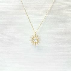 -The sun shaped pendant is made with high-quality 14K solid gold. Also we have listed bracelet and earrings with the same models. So you can combined them. https://www.etsy.com/shop/LatikaJewelryShop - High polish finish and set with flawless cubic zirconia stones. - This dainty, delicate and trendy pendant necklace has been artfully designed for timeless yet modern millennial fashion and you can order in three different colors, yellow , white and rose. - This 14K solid gold pendant comes with a White Gold Plated Jewelry With Diamond Cut, White Gold-plated Jewelry With Diamond Cut, Celestial Pendant Jewelry With Cubic Zirconia, Gold Celestial Necklace With Cubic Zirconia, Celestial Cubic Zirconia Pendant Jewelry, Dazzling Diamond Cut Jewelry Gift, Gold Pendant Jewelry With Sparkling Stones, Celestial Jewelry In Diamond White 14k Gold, Celestial Cubic Zirconia Jewelry In Diamond White