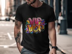 This colorful hip hop T-shirt features a vibrant sublimation design, perfect for streetwear enthusiasts and urban fashion lovers. The unique graphic on this tee makes it a standout piece for any casual outfit. Whether you're hitting the streets or just relaxing, this hip hop print shirt is sure to add a stylish touch to your wardrobe. Product Features: Fabrication: 100% Airlume combed and ring-spun cotton, 32 single 4.2 oz. (Ash - 99% Airlume combed and ring-spun cotton, 1% poly) Seams: Side-sea Hip Hop Style Cotton T-shirt With Custom Print, Hip Hop Style Cotton T-shirt With Graphic Print, White Hip Hop T-shirt With Sublimation Print, Hip Hop Style Crew Neck T-shirt With Character Print, Multicolor Graphic Print Hip Hop T-shirt, Hip Hop Print, Unique Streetwear, Fashion Top, Print Shirt