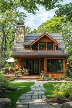 a house with a stone walkway leading to the front door