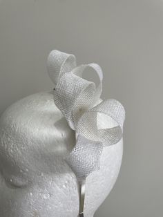 Item: White sinamay loop fascinator on a metal headband! Size: Approx. 3cms high and 3cms wide. Postage: The postage in this listing is regular post via Australia Post. Please allow approximately 7-10 days for postage at Australia Post (for metro areas) and more for regional areas.   Customise:  If you would like something added, deleted or changed, please send me a message to see if it is possible.  Postage: The postage in this listing is regular post via Australia Post. Please allow approximat Cream Fascinator, Red Orchids, Headband Size, Metal Headband, Human Head, Australia Post, Metal Headbands, Mannequin Heads, Etsy Australia