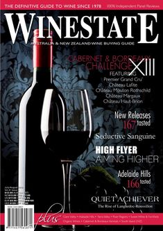 the front cover of wine state magazine with a glass of red wine next to it