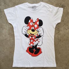 Disney Minnie Mouse Tee Shirt White Style: Graphic Tee Sleeve Style: Sleeveless Material: Cotton Blend Theme: Minnie Mouse Pattern: Geometric Color: White Size (Women's): Small Size Type: Regular Cute Minnie Mouse T-shirt For Summer, Minnie Mouse Crew Neck Top For Disney Events, Minnie Mouse Crew Neck Top For Disney Trips, White Mickey Mouse T-shirt, Disney Minnie Mouse Summer Tops, Playful Minnie Mouse Crew Neck Top, Cute Minnie Mouse Tops For Disney Trips, Cute Minnie Mouse Top For Disney Trips, Cute Minnie Mouse Cotton Top