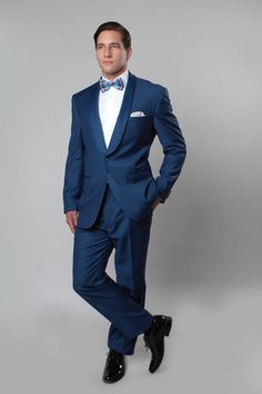 Shop Men's Blue One Button Satin Shawl Lapel Collar Tuxedo at flexsuits.com. Classically stylish with a modern edge, this two-piece tuxedo is one of our most fashion-forward dress tuxedos for men. Mens Tux, Cool Tuxedos, Blue Tuxedo, Button Shawl, Wedding Tux, Satin Shawl, Shawl Style, Blue Tuxedos, Slim Fit Tuxedo