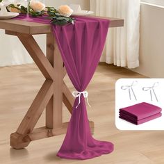 the table is covered with purple cloths and flowers