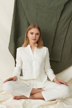 "🌿 DETAILS 🌿 ✳ Relaxed shape ✳ Splits on the sides of the shirt ✳ V-neck shirt ✳ Long sleeves ✳ No button shirt 🌿 DESCRIPTION 🌿 There isn't any formal definition to what constitutes meditation clothes. As long as they are high quality, comfortable, and thus won't distract you from your meditation.  This tunic is definitely a great choice for your next meditation session. As it's made from quality linen, it feels breathable, soft and lightweight. For some people, the use of natural materials also shows a symbolic connection with the earth. Being comfortable and relaxed is a big part of meditation. No matter where you choose to practice meditation, your own home, retreat camp or holy places, this piece will suit you everywhere.  🔸Please note that due to the many variations in monitors a White Linen Tunic Blouse, White Long Sleeve Linen Tunic, White Linen Long Sleeve Tunic, White Linen Tunic With Long Sleeves, Meditation Clothes, Home Retreat, Meditation Outfit, Spiritual Clothing, Linen Suit