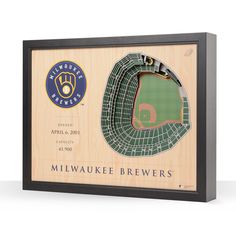 a wooden frame with a baseball stadium map and the words milwaukee brewers in black lettering