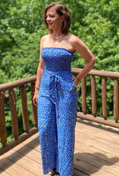 This is an item that I've never had before. A strapless jumpsuit. I usually steer clear of strapless items, because I don't feel comfortable in them. I have to say that this one feels very secure. It features a smocked tube top that sucks you in at the right places, a tie at the waist, and pockets. It is also lined down to about mid-thigh. Isn't this blue color amazing? Runs a little small. I would size up. I am wearing the medium. Sizes: Small-Large Follow tag instructions for washing. Smocked Tube Top, Land Of The Free, Strapless Jumpsuit, Tube Top, Jumper, Blue Color, Jumpsuit, Rompers, Wardrobe