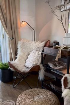 a living room filled with furniture and decor