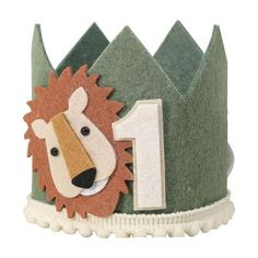 a green crown with a lion on it's face and number 1 in the middle