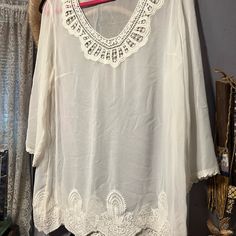 Coldwater Creek Ivory Sheer Large Blouse With Lace At The Semi V Neck, Hemline And Bottom Of Sleeves. New Never Worn. Sleeves Are Long And Loose Fitting. Beautiful Blouse! Flowy Bohemian Cream Blouse, Elegant Flowy Blouse For Vacation, Summer Lace Trim Tunic Blouse, Cream V-neck Blouse For Vacation, White Sheer Summer Top, Feminine Flowy Cream Blouse, Flowy Beige Summer Blouse, Cream Summer Blouse For Vacation, White Feminine Blouse For Vacation