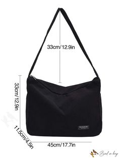 a black shoulder bag with measurements