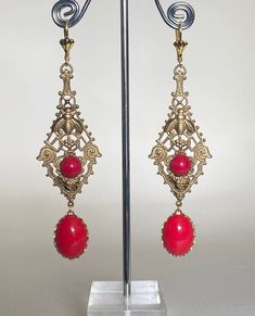 "Very dramatic pair of  Art Deco statement earrings in Ornate Bohemian  style  Lovely Antique gold Filigree panel set with red glass stones and bee motif   Finished with vintage red glass stones cabochon drops to the bottom Earrings look very dramatic on & will generate lots of comments  Earrings have lever back wires gold plated  for pierced ears, lead & nickel free In excellent condition Size: just over 3 & 1/2\" (9 cm) long ,  these are quite long so please check size before buying- if big earrings are not your thing please have a look at some of my other designs." 1920s Bohemian, Flapper Art, Art Deco 1920s, Cabochons Stones, Gold Filigree, Big Earrings, Boho Stil, Style Boho, Red Glass