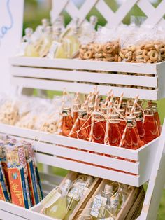 an assortment of drinks and snacks are on display