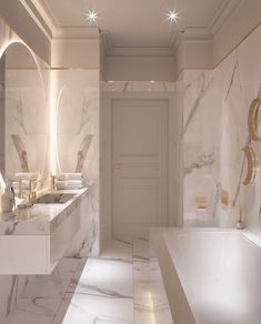 a bathroom with marble walls and flooring is shown in this image, there are two sinks on either side of the bathtub