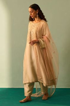 Buy Green Lining Crepe Embroidered Zardozi Round Choga Salwar Set For Women by Angad Singh Online at Aza Fashions. Semi-stitched Sets With Gold Embroidery And Traditional Drape, Traditional Gold Palazzo Set With Zari Work, Unstitched Dola Silk Palazzo Set For Reception, Designer Silk Salwar Kameez With Zari Work, Semi-stitched Kurta With Gold Embroidery For Festivals, Gold Palazzo Set With Traditional Drape For Eid, Gold Palazzo Set For Eid With Traditional Drape, Gold Semi-stitched Palazzo Set For Festive Occasions, Festive Sharara With Gold Embroidery