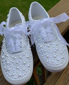 Beautiful pearl and rhinestone covered Vans Classic or Platform Vans with or without your wedding date on the side. Please include date you want on the shoe or leave it blank and it will be just pearls. Satin ribbon laces are added to make this shoe complete Other shoes can be done including Converse and Keds. Please message me your ideas Bling Shoes Vans, White Pearl Wedding Shoes For Bridal Shower, Elegant Wedding Sneakers With Rhinestones, Elegant Lace-up Wedding Shoes With Rhinestones, Elegant White Embellished Sneakers, Elegant Embellished White Sneakers, Elegant Embellished Sneakers For Wedding, Elegant White Sneakers For Bridal Shower, Pearl Embellished Lace-up Wedding Sneakers