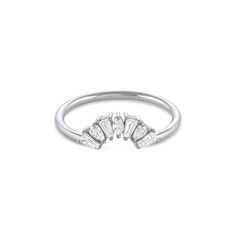 The Sunflower Ring showcases a fan of marquise, tapered baguette, and pear cut shimmering diamonds that arch around a center stone and enhance its natural sparkle. With modern and romantic vibes, the Sunflower Ring is truly the ultimate addition to any bridal stack. The Sunflower Ring will complement any engagement ring with ease and make you look and feel like the brightest in the room. They won't be able to stop staring! Pear-shaped Baguette Diamond Jewelry, Marquise Cut Diamond White Ring With Baguette Diamonds, Baguette Diamond Marquise Cut Promise Ring, Silver Marquise Cut Diamond Ring With Baguette Diamonds, Silver Marquise Cut Diamond Ring With Baguettes, Silver Marquise Diamond Ring With Baguette Diamonds, Silver Marquise Ring With Baguette Diamonds, Baguette Diamond Marquise Cut Jewelry, Marquise Cut Cubic Zirconia Ring With Baguette Diamonds