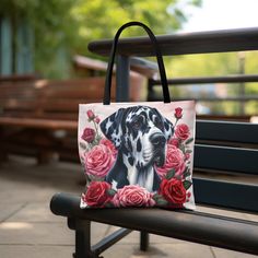 "**Please Review the Size Chart/Product Dimensions Before Placing an Order** Every Great Dane Lover will be happy to have this adorable Tote bag featuring a beautiful Pink Roses design with your favorite dog breed - Great Dane! This spacious tote bag will be the best companion for a trip to the market or pet store and for hauling your pup's accessories on your next trip to the dog park! (These Totes also make a great Gift Bag for additional Birthday and Holiday gifts! ) This adorable tote is a great gift for dog moms, dog sitters, and more. It's made from spun polyester and is extremely durable. The design of the tote is simple with two comfortable shoulder straps yet spacious and functional. About the Tote: This practical, high-quality tote bag is available in three sizes. All-over print Valentine Gift For Mom, Dog Valentine, Mom Tote Bag, Roses Design, Beautiful Pink Roses, Graphic Design Software, Soft Bristle Brush, Dog Park, Valentine Gift