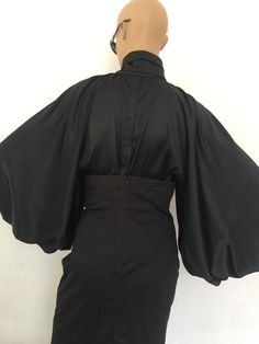 "Amazing and extravagant silk blouse with stand up collar and removable bow tie .Rich puffy sleeves. Elegant and extravagant, perfect for your special occasions. SIZE S - US 6, UK 8, EU 36 bust: bust around 34.5\"/90cm Waist: waist around 27.5\"/70cm Hips: hips around 34.5\"/90cm SIZE M - US 8, UK 10, EU 38 bust: bust around 37.5\"/95cm Waist: waist around 29.5\"/75cm Hips: hips around 37.5\"/95cm SIZE L - US 10, UK 12, EU 40 bust: bust around 39.5\"/100cm Waist: waist around 31.5\"/80cm Hips: h Puff Sleeves Blouse, Grunge Jacket, Black Silk Blouse, Blouse Silk, Sleeves Blouse, Satin Blouses, Red Blazer, Chiffon Long Sleeve, Satin Shirt