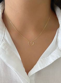 "Minimalist Dainty 14K Yellow Gold Open Heart Charm Necklace. Necklace Is Adjustable From 18\" To 16\" Inch. Perfect For Everyday Wear. Treat Yourself Or Someone Special To This Beautiful Necklace. Perfect For Layering. Chain Is A High Quality Box Chain That Feels Like Silk. Jewelry Comes In A Cute Jewelry Box Ready To Present. Model Is Wearing A 16\" Inch Chain. -All Jewelry Is New And Inspected For Quality Assurance. -jewelry Is Crafted In Genuine High Quality 14K Gold. -We Do Not Sell Gold Pl Elegant 14k Gold Filled Heart Necklace, Delicate 14k Yellow Gold Heart Necklace, 14k Gold Heart Cut Necklace With Adjustable Chain, 14k Yellow Gold Heart Necklace With Delicate Chain, Elegant Heart-shaped Simple Jewelry, Dainty Cable Chain Jewelry For Valentine's Day, Minimalist Heart Charm Jewelry For Everyday, Minimalist Cable Chain Jewelry For Valentine's Day, Minimalist 14k Gold-filled Jewelry With Heart Charm