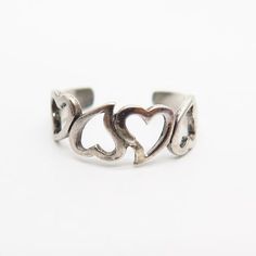 925 Sterling Silver Heart Design Adjustable Ring Size 5.5Weight: 1.3gWELCOME TO PAWN SHOPWe are an actual pawn shop and have been in business for over 25 years.Since 1990, our establishment has been serving a variety of clients by providing them with short term cash solutions and options of liquidity regarding their treasured heirlooms.Acknowledging that today′s customers are very sophisticated and are looking for a variety of investments, our acquisitions are hand-picked for our special cliente Nickel Free Heart Shaped Anniversary Rings, Nickel-free Sterling Silver Rings For Valentine's Day, Nickel-free Heart Ring For Anniversary, Nickel-free Heart Shaped Anniversary Rings, Sterling Silver Hypoallergenic Heart Ring For Anniversary, Adjustable Nickel-free Sterling Silver Heart Ring, Adjustable Toe Rings For Anniversary, Adjustable Nickel Free Silver Heart Ring, Valentine's Day Silver Midi Rings In Sterling Silver