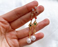 Item Information: -material: 14k gold plated, zircon, brass, s925 sterling silver, 8mm round high quality freshwater pearls  -closure: push back -come with a velvet box -length: 6cm -due to the nature of freshwater pearls, these pearls have little flaws Shipping policy: Domestic orders will be shipped via Canada Post with tracking number, should arrive in 3-5 business days, but some delays may occur, please be patient with your order. US orders will be shipped via Canada Post tracked packet, should arrive in 4-13 business days, but some delays may occur, please be patient with your order. Jewelry Care: -avoid exposure to water, liquids, skincare, and cosmetic products -remove when showering, bathing, or swimming  -remove jewelry before going to bed or participating in physical activities Pearl Drop Earrings, Bridal Earrings, Jewelry Care, Freshwater Pearls, Jewelry Earrings Dangle, Pearl Earrings, Etsy Earrings, Dangle Drop Earrings, Dangle Earrings