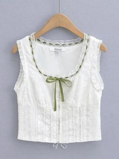 ⚡Buy 2023 Broderie Lace White Cropped Tank Top White S under $35.00 in Tops&Tees at AnotherChill.com Online. Style: Casual/Street/Y2K/Sexy/Sweet/Vintage. Fabric Content: Polyester Blend. Fit Type: Slim fit. Neckline: Crew Neck. Sleeve Length: Sleeveless. : Step up your fashion game with this adorable lace-up cropped tank top. Featuring a satin tie detail and a back criss-cross lace-up design, it's the perfect combination of cute and sexy. The eye-hook fasten on the front adds an extra touch of c White Crop Top Tank, Lace Trim Blouse, Vest Crop Top, Vintage Mode, Modieuze Outfits, Lace Hem, Moda Vintage, Mode Inspo, 가을 패션