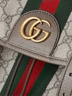 Gucci's hiking-inspired 'Ophidia' backpack has been crafted in Italy from durable monogrammed coated-canvas that the brand calls 'Supreme'. Featuring signature house codes like striped webbing and 'GG' hardware, it's trimmed with leather and has plenty of pockets for organisation, including a padded laptop sleeve. Gucci Collection, Gucci Ophidia, Tablet Sleeve, Brown Coat, Gucci Accessories, Canvas Backpack, Mr Porter, Laptop Sleeve, Fashion Advice