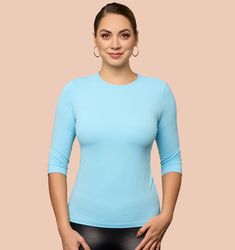 This exquisite 3/4 Sleeve Crew Neck Layering Top is a must-have for any sophisticated wardrobe. Crafted from luxurious Italian microfiber, this fabric is both soft and wrinkle-resistant, providing ultimate comfort and style. Its form-fitting design beautifully accentuates your curves without sacrificing comfort. Stretch 3/4 Sleeve Tops For Work, Elegant Fitted Top With 3/4 Sleeves, Elegant Stretch Top With 3/4 Sleeves, Elegant Stretch Top With Half Sleeves, Sophisticated Wardrobe, Italian Lingerie, Ideal Wardrobe, Plus Size Winter, Layered Tops