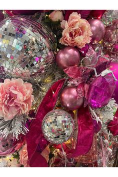 pink and silver ornaments with flowers on them