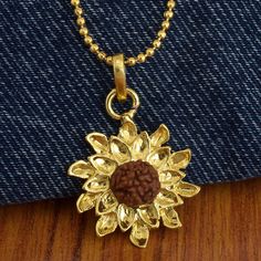 Material :- Brass Antique and Partywear Floral Design Rudraksha Pendant With Chain Care :- It is advisable to store jewellery in a zip lock pouch (air tight pouch), keep away from water perfume and other chemicals and clean it with dry and soft cloth Brass Necklace As Diwali Gift, Brass Necklace For Diwali Gift, Navratri Brass Jewelry Gift, Antique Gold Necklace With Tilla For Gifts, Adjustable Chain Jewelry For Festivals And Gifts, Adjustable Chain Jewelry For Festivals Gift, Antique Gold Tilla Jewelry As Gift, Festival Jewelry Gift With Adjustable Chain, Festival Gift Jewelry With Adjustable Chain