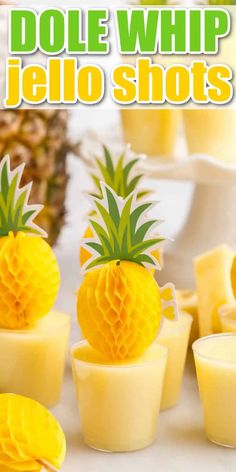 pineapple jello shots are arranged in small cups