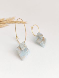 Polymer Clay Earrings in a beautiful aquamarine color, designed as small hoop dangle earrings, are a delightful mix of style and elegance. These lightweight earrings are perfect for adding a touch of grace to any outfit. Whether you're searching for beatiful and unique gifts for her, your sister, or mom, these earrings are sure to be a hit. The combination of Polymer Clay, a lovely aquamarine hue, and the playful small hoop dangle design makes these earrings a standout accessory. Handmade with c Leaf Jewelry Necklace, Clay Earrings Small, Earrings Small Hoop, Aquamarine Color, Handmade Hoop Earrings, Aquamarine Colour, Leaf Jewelry, Earrings Small, Unique Gifts For Her