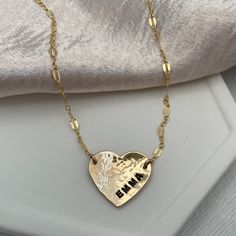 Love is always in style with our Hammered Personalized Heart Necklace. This customer favorite is ideal for initials, a date, a nickname, or a short word. The charming, vintage-style link chain is the perfect finishing touch and adds a romantic vibe. Available in sterling silver or gold finish. Chains and findings are 14kt gold fill or sterling silver. Charm is approx. 3/4 inch. Can be personalized with 6 characters max. Popular symbols for personalization are ♥ &, +(use * to symbolize the heart