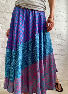 "This is trendy boho long skirt made of upcycled silky material very comfortable  easy to wear with elasticated waist made alvays unique one of a kindfor all boho spirit fashion lovers Perfect for daily wear and parties or summer festivals and holidays  MEAESURE elasticated waist 28-37\" length 36\" MATERIAL *silk *no lining CARE INSTRUCTIONS  * Wash in warm water * Hand wash recommended * Hang to dry Please visit also  https://www.etsy.com/shop/AltheaStores Fo more ideas   IMPORTANT NOTE  * Ple Flowy Boho Print Maxi Skirt, Floral Print Flowy Maxi Skirt For Festival, Flowy Floral Print Maxi Skirt For Festival, Flowy Maxi Skirt With Boho Print, Flowy Floral Maxi Skirt For Festival, Bohemian Midi Dress With Lined Skirt, Bohemian Flared Maxi Skirt With Elastic Waistband, Relaxed Festival Maxi Skirt, Festival Maxi Skirt With Relaxed Fit And Lining