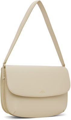 Vegetable-tanned buffed leather shoulder bag in beige. · Fixed carry handle · Logo stamp at face · Accordion panel at sides · Magnetic flap · Patch pocket at two-compartment interior · Cotton canvas lining · H7.5 x W9.75 x D2.25 Supplier color: Cream Classic Beige Rectangular Flap Bag, Timeless Beige Rectangular Flap Bag, Classic Beige Shoulder Bag With Removable Pouch, Classic Beige Shoulder Flap Bag, Classic Beige Baguette Bag With Detachable Strap, Classic Beige Baguette Bag For Formal Occasions, Classic Beige Canvas Shoulder Bag, Timeless Cream Shoulder Bag For Daily Use, Timeless Cream Rectangular Bag