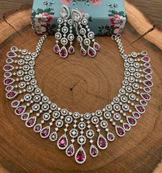 Diamond collection in Kalyan features beautiful choker necklaces which look amazing when worn on your neckline. Browse necklaces from our biggest collection. Pink Jewelry Set, Traditional Necklace, Beautiful Chokers, Gota Work, Pink Set, Work Suits