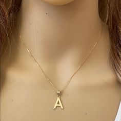 Description: Solid 10k Gold Small Milgrain Initial Letter A Pendant Necklace Metal Type: 10k Solid Yellow Gold (Also Available In 14k Solid Gold) Metal Color: Yellow Gold. (Also Available In White Gold And Rose Gold) Pendant Weight: 0.7 Grams Pendant W/Chain : 1.7 - 1.9 Grams (Vary From Chain) Height With Bale: 0.87 In (22 Mm) Width: 0.45 In (11 Mm) Chain Available In 16", 18", 20", 22" Available In Another Listings In Any Letter A-Z Note: Made To Order. Please Allow 8-12 Days To Ship Letter A Pendant, Shine Jewelry, Rose Gold Pendant, Letter A, Initial Letter, Initial Letters, Metal Necklaces, Metal Color, Solid Yellow