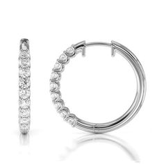 Classic diamond hoop earrings featuring a single line of shimmering round cut brilliant diamonds. The easy hinged clicker style makes these earrings easy to wear all day long. Gorgeous Engagement Ring, Single Line, Diamond Hoop Earrings, Halo Engagement Ring, Brilliant Diamond, Conflict Free Diamonds, Diamond Gemstone, High Quality Jewelry, Diamond Studs