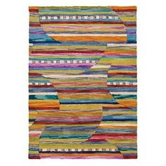 a multicolored area rug with stripes on the bottom, and an abstract design