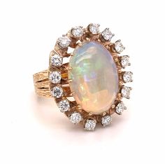 an opal and diamond cluster ring