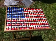 a table made out of beer bottle caps