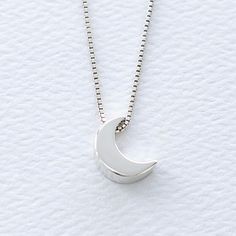 "Mini Crescent Moon Sterling Silver Necklace, FREE SHIPPING, Petite Lunar Moon Jewelry, Girl's Celestial Moon Charm Birthday Necklace Gift A brilliant solid sterling silver petite crescent moon bead hangs from your choice of sterling silver box or petite cable chain. This necklace is a classic look and is easy and versatile with any style of dress. Makes a great gift for mom, wife, friend, sister, daughter, or girlfriend. To view the larger crescent moon version of this necklace click here: http Adjustable Crescent Moon Phase Charm Necklace, White Moon-shaped Necklace For Gift, Moon Shaped White Necklace For Gift, White Moon Shaped Necklace For Gift, White Half Moon Necklace With Moon Charm, Mother's Day Moon Shaped Necklace, White Adjustable Necklace With Moon Charm, Adjustable White Necklace With Moon Charm, Adjustable Moon Phase Charm Necklace Gift